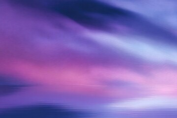Fototapeta premium Vibrant purple and pink sky at sunset creating a tranquil atmosphere over calm water