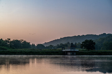 Naklejka premium Sunrise over the Lake