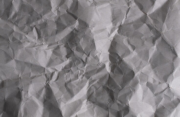 Obraz premium Crumpled grey paper background. Crumpled paper texture.