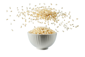 Light and airy rice puffs dance above a bowl in a whimsical culinary display