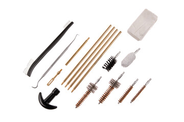Disassembled gun cleaning kit components on white.