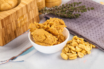 Crunchy peanut butter fat product