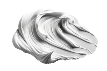 Swirls of creamy texture on a smooth, white surface showcasing artistic design elements