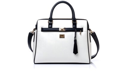 White and black handbag with gold hardware