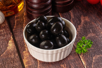 Mediterranean marinated Black olives in the bowl