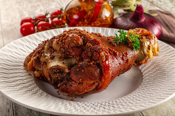 Baked pork knuckle with spices