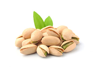 Pistachio nuts on white backgrounds .