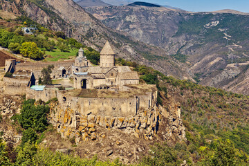 View of Tatev Monastery - 9th-century Armenian Apostolic Christian monastery standing on a large...