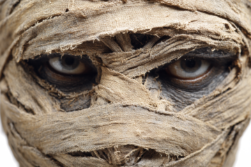 Close-up of a mummys face wrapped in bandages ancient Egyptian concept Halloween costume idea