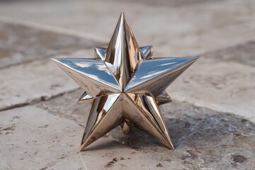 Shiny silver seven point star stands on gray surface, reflecting light, creating shadows, and sparkling