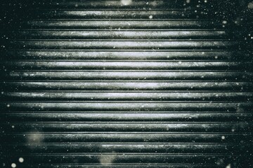 Grayscale metal shutter backdrop with horizontal lines, aged appearance, speckled highlights