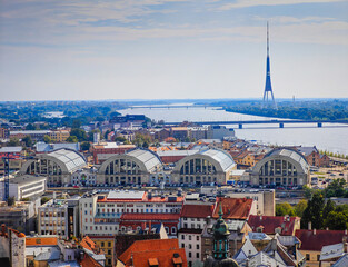 Riga Central Market. Aerial drone view of Riga old town with TV tower in distance