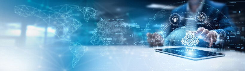 Fototapeta premium Businessman using tab and analysis automation data. workflow optimization tools, intelligent robotic systems, AI-powered task execution, continuous process integration, efficiency-driven operations
