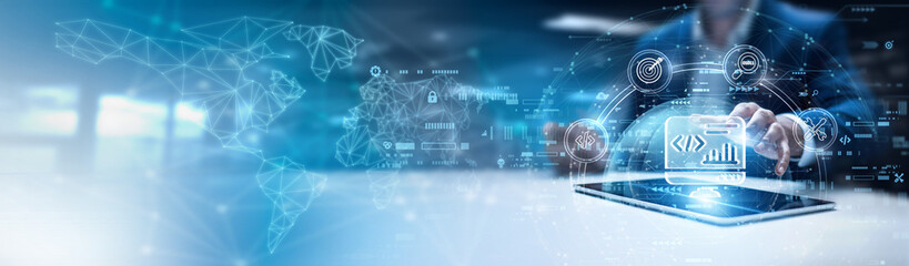 Businessman using tablet and analyzing software development data, agile sprint progress, coding...