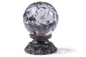 Crystal ball on a decorative stand a symbol of fortune telling and prediction isolated on white