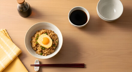 Delicious Fried Rice Dish with Sunny Egg and Chopsticks on a Wooden Table
