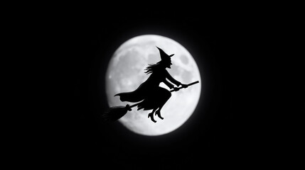 Silhouette of a witch flying on a broom across the moon