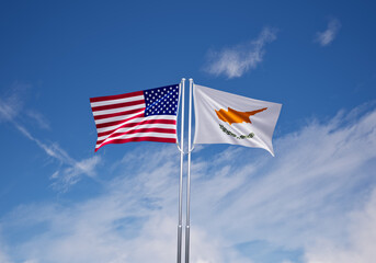 flags of  cyprus and United States of America over blue sky background.