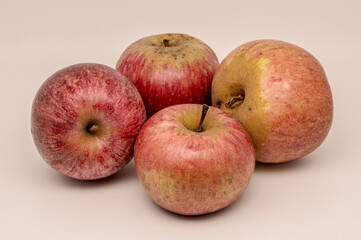 A composition of a typically autumnal fruit, such as the Annurca apples from Campania, which enhances its beauty and details.