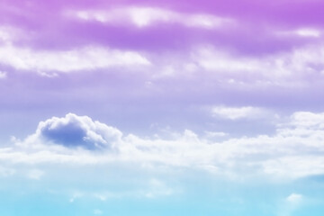Obraz premium Pastel sky purple pink blue with white cloud. Fantasy background. Summer Spring backdrop. Beautiful colourful nature sky.