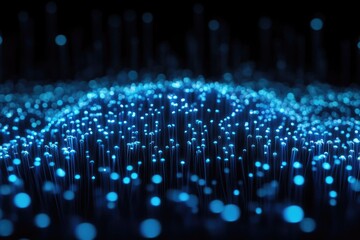 A mesmerizing abstract rendering of glowing blue lights forming an interconnected network, symbolizing data, technology, or digital communication flowing across a dark landscape.