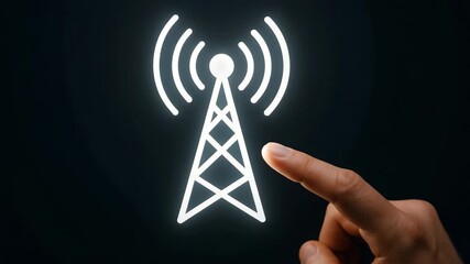Video of a wireless tower icon on a screen with a finger touching it. Conceptual view of communication and technology.  - Powered by Adobe