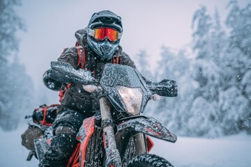 Adventure motorcycling in winter conditions Snowy day with a snow bike Enduro off road travel Active lifestyle theme with winter gear Vertical image