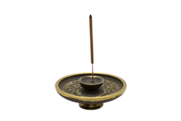 An incense stick stands upright in a small, ornate bronze incense burner. background removed