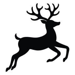 Silhouette of a majestic stag with large antlers in a leaping pose