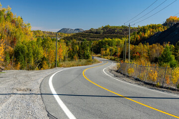 A road between mining residues