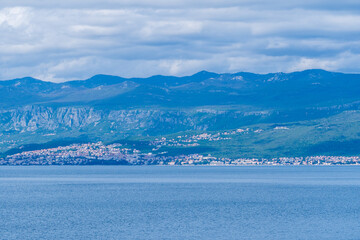 Vrbnik, Croatia - April 20, 2025: Panoramic view of the mountains and sea. Beautiful landscape of mountains, sea, and forest