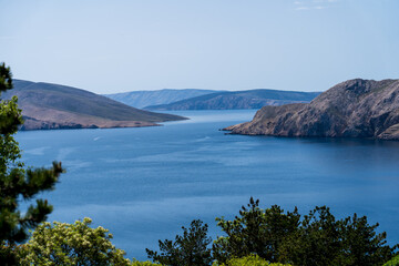 Prvić Island and Sveti Grgur, Croatia - April 20, 2025: Panoramic view of the mountains and sea.