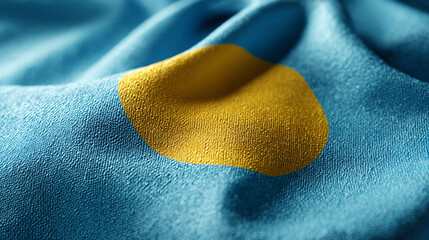 The emblem of Palau, with a vibrant yellow sphere in the center, is showcased against a striking cyan backdrop, presenting the flag's colors and symbolism.