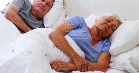 Opening shot showing senior couple lying on bed under comforter and rising chests tracking sleep - Powered by Adobe