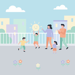 Happy family playing outdoors on a city rooftop enjoying a sunny day together