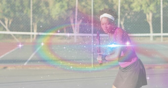 Woman stepping onto tennis court causing sparkles shifting backhand forehand swinging for fitness