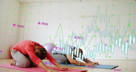 Friends entering gym unrolling yoga mats shifting into child's pose, chart overlay tracking metrics - Powered by Adobe