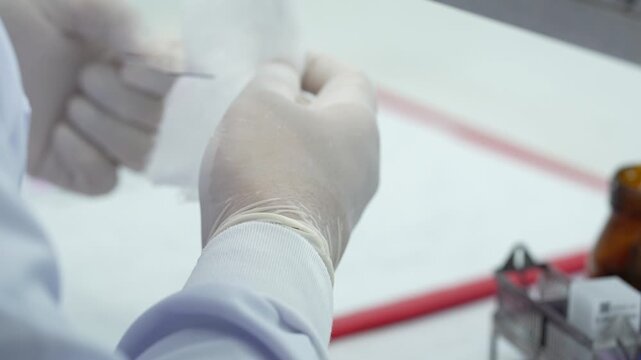 A researcher prepares a 'smart slide' with integrated biosensors, mounting a nano-coated coverslip for real-time analysis by an AI-powered digital microscope.