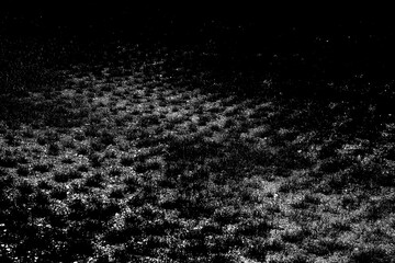 Textured and abstract black and white background. Black illustration of a ground. Grey and black background with pattern. 
