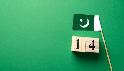Pakistan Independence Day Wooden Blocks and Flag.