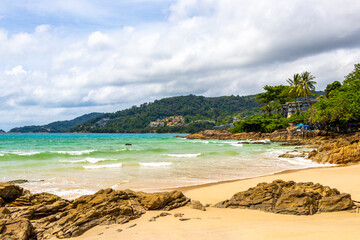 Patong Beach Phuket with turquoise blue water white sand Thailand.