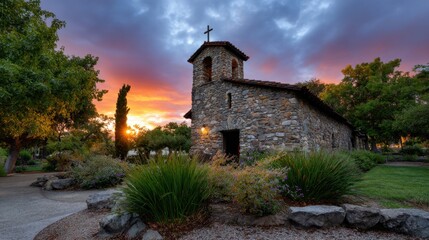 Fototapeta premium Scenic Stone Chapel Under Colorful Sunset Sky with Trees