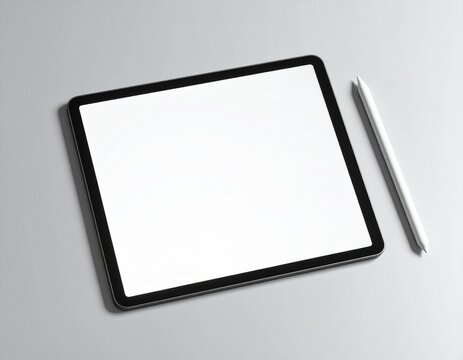 Modern tablet displaying blank screen with stylus on light surface