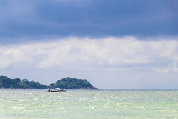 Obraz premium Patong Beach Phuket with turquoise blue water white sand Thailand.