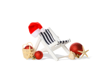Christmas-decorated beach chair with a hat, on white, PNG