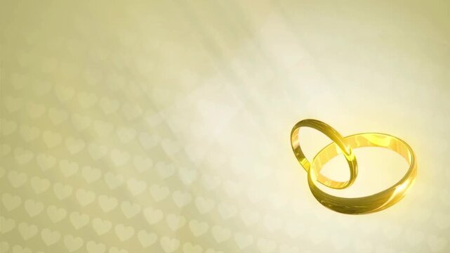 Two interlocking gold wedding rings glowing on a soft, warm background with a subtle pattern of hearts.