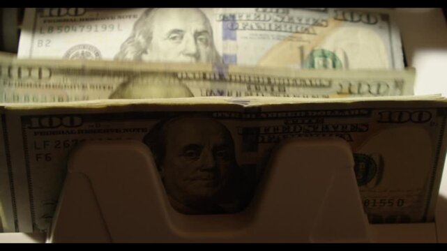 Counting cash. Dollar bills motion. Cash machine count dollar in action. Dollars paper money. Counting 100 dollar bills. Easy money. Counting machine with dollar bill. Money counter. Banking concept.