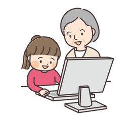 孫と一緒にパソコンで勉強するシニア女性