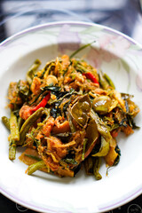 Authentic Kaeng Ho dish, Northern Thai stir-fry curry on plate