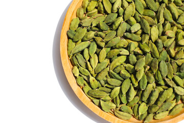 Green cardamom pods with aromatic and medicinal benefits.